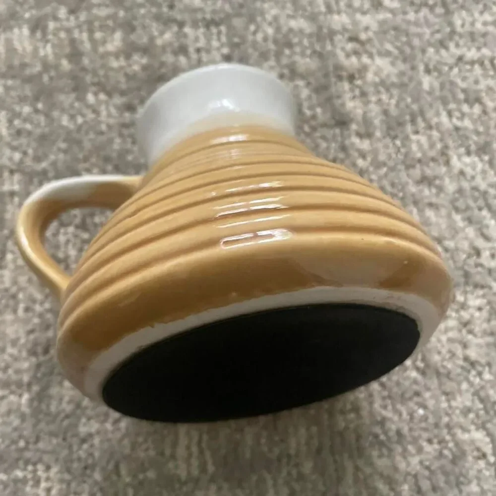 Source Unknown yellow white
